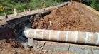 Novo bueiro de concreto em execução