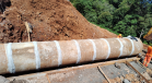 Novo bueiro de concreto em execução