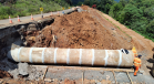 Novo bueiro de concreto em execução