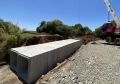 Obra de recuperação da PR-540 em Entre Rios - lançamento de aduelas das galerias de concreto