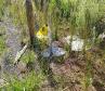Lixo descartado na faixa de domínio de rodovias estaduais